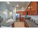 Modern kitchen featuring stainless steel appliances and wood cabinetry at 3592 Gloucester Gate St, Las Vegas, NV 89122