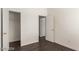 Well-lit bedroom with gray flooring and access to a closet at 3728 Shallow Dove Ct, North Las Vegas, NV 89032