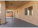 Covered patio with concrete flooring and access to backyard at 3728 Shallow Dove Ct, North Las Vegas, NV 89032