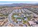 Aerial view of community, highlighting the pool and tennis courts at 4308 Sunrise Flats St, Las Vegas, NV 89135