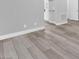 Gray tone wood-look floor covering at 4308 Sunrise Flats St, Las Vegas, NV 89135