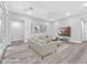 Bright living room with hardwood floors and staged furniture at 4308 Sunrise Flats St, Las Vegas, NV 89135