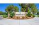 Mountain Falls community entrance with stone signage and landscaping at 4380 E Brusca Way, Pahrump, NV 89061