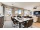 Dining area with large table and chairs, adjacent to the kitchen at 4380 E Brusca Way, Pahrump, NV 89061