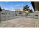 Landscaped backyard with tiered planters and a concrete patio at 4457 Dennis Way, Las Vegas, NV 89121