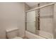 Modern bathroom with shower/tub combo, updated vanity, and tile flooring at 4457 Dennis Way, Las Vegas, NV 89121