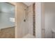 Clean shower with tile surround and neutral tones at 4457 Dennis Way, Las Vegas, NV 89121