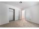 Bright bedroom with a window and mirrored closet doors at 4850 Aveneda Grande, Las Vegas, NV 89121