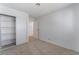 Bedroom with mirrored closet doors and neutral carpet at 4850 Aveneda Grande, Las Vegas, NV 89121