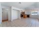 Open dining area with tile floors and kitchen access at 4850 Aveneda Grande, Las Vegas, NV 89121