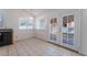 Bright dining area with backyard access and tile floors at 4850 Aveneda Grande, Las Vegas, NV 89121