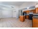 Open dining area with kitchen and vaulted ceiling at 4850 Aveneda Grande, Las Vegas, NV 89121