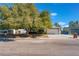 House exterior showcasing a tree and front yard at 4850 Aveneda Grande, Las Vegas, NV 89121