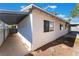 Side view of the house showcasing a covered walkway at 4850 Aveneda Grande, Las Vegas, NV 89121