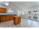 Kitchen with wood cabinets and an island at 4850 Aveneda Grande, Las Vegas, NV 89121