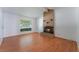 Living room with hardwood floors and fireplace at 4850 Aveneda Grande, Las Vegas, NV 89121