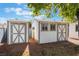 Two-storage sheds with gray and white exterior at 4850 Aveneda Grande, Las Vegas, NV 89121