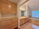 Elegant bathroom with double sinks and soaking tub at 4974 Crooked Stick Way, Las Vegas, NV 89113