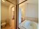 Main bathroom with separate toilet area at 4974 Crooked Stick Way, Las Vegas, NV 89113