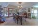 Bright dining room with a view of the pool and patio at 56 Sawgrass Ct, Las Vegas, NV 89113