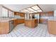 Spacious kitchen with an island and stainless steel appliances at 56 Sawgrass Ct, Las Vegas, NV 89113