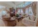 Elegant living room featuring a large window and stylish furnishings at 56 Sawgrass Ct, Las Vegas, NV 89113