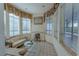 Cozy sitting area with fireplace, built-in shelving and window seating at 56 Sawgrass Ct, Las Vegas, NV 89113