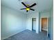 Bright bedroom with ceiling fan and closet at 6234 Hopeful Light Ave, Las Vegas, NV 89139