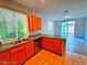 Kitchen with wood cabinets, granite counters and stainless steel appliances at 6234 Hopeful Light Ave, Las Vegas, NV 89139