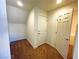 Small hallway with two doors and carpet at 6335 Rock Stream Ln, Las Vegas, NV 89141