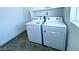 Bright laundry room with washer and dryer included at 6335 Rock Stream Ln, Las Vegas, NV 89141