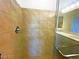 Clean shower with beige tile surround at 6335 Rock Stream Ln, Las Vegas, NV 89141