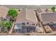 Aerial view of house, backyard, and shed; features a pergola and patio at 6458 Bluehurst Ave, Las Vegas, NV 89156