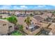 Aerial view showcasing home, backyard oasis with pergola, and neighborhood at 6458 Bluehurst Ave, Las Vegas, NV 89156