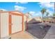 Backyard with shed and gravel landscaping at 6458 Bluehurst Ave, Las Vegas, NV 89156