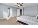 Spacious bedroom with ceiling fan and ample closet space at 6513 Heavenly Moon St, North Las Vegas, NV 89084