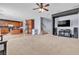 Open floor plan living room, kitchen and stairs at 6513 Heavenly Moon St, North Las Vegas, NV 89084