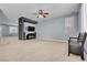 Living room with built-in entertainment center at 6513 Heavenly Moon St, North Las Vegas, NV 89084