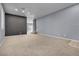 Spacious living room with neutral walls and carpet at 6513 Heavenly Moon St, North Las Vegas, NV 89084