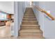 Carpeted staircase leading to the upper level of the home at 6513 Heavenly Moon St, North Las Vegas, NV 89084