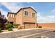 Charming two-story home featuring a two car garage, desert landscaping, and traditional architecture at 658 Forest Peak St, Henderson, NV 89011