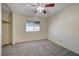 Bright bedroom featuring ceiling fan and ample closet space at 6750 Del Rey Ave # 262, Las Vegas, NV 89146