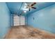 Attached garage with ceiling fan and workbench at 6750 Del Rey Ave # 262, Las Vegas, NV 89146