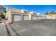 Row of attached garages with ample parking space at 6750 Del Rey Ave # 262, Las Vegas, NV 89146