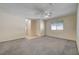 Living area with carpet, ceiling fans and entryway at 6750 Del Rey Ave # 262, Las Vegas, NV 89146