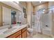 Clean bathroom with a shower/tub combo and updated vanity at 70 Portezza Dr, Henderson, NV 89011