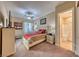 Bright bedroom with ensuite bath and ceiling fan at 70 Portezza Dr, Henderson, NV 89011