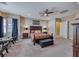 Main bedroom with a king-size bed and ensuite bathroom at 70 Portezza Dr, Henderson, NV 89011