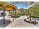 Elegant courtyard with gazebo and fountain, featuring a beautiful building in the background at 70 Portezza Dr, Henderson, NV 89011