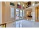 Two-story entryway with French doors leading to the backyard at 70 Portezza Dr, Henderson, NV 89011